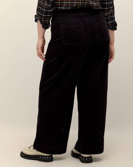 Pantalon en velours côtelé à jambe évasée, coupe galbée