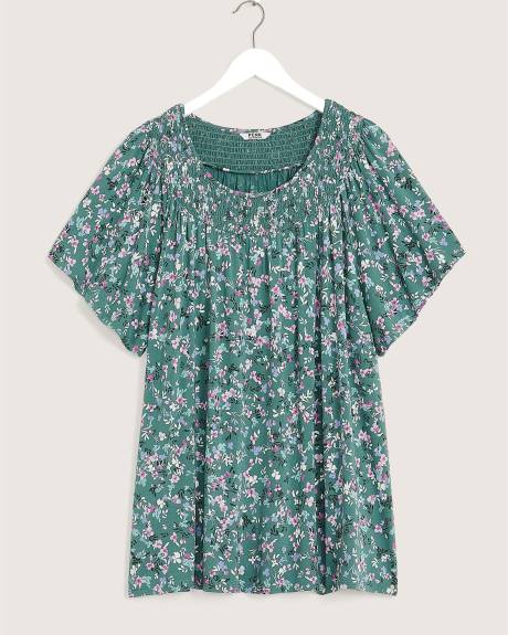 Haut long en tricot fleurie avec encolure à smocks, tissu responsable