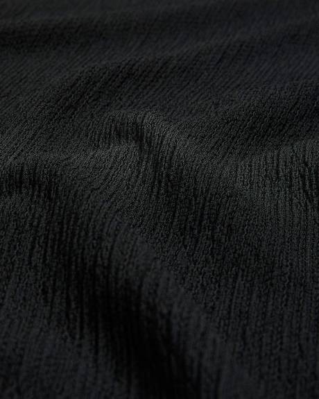 Robe mi-longue en tricot texturé
