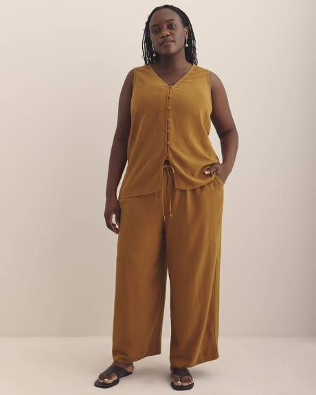 Blouse boutonnée sans manches à encolure en V