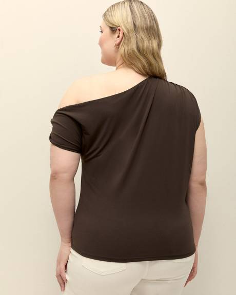 Haut à manches torsadées asymétriques