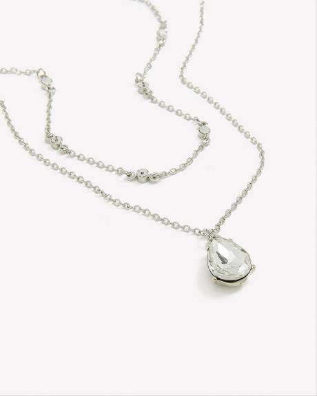 Collier court à deux chaînes avec pierre claire