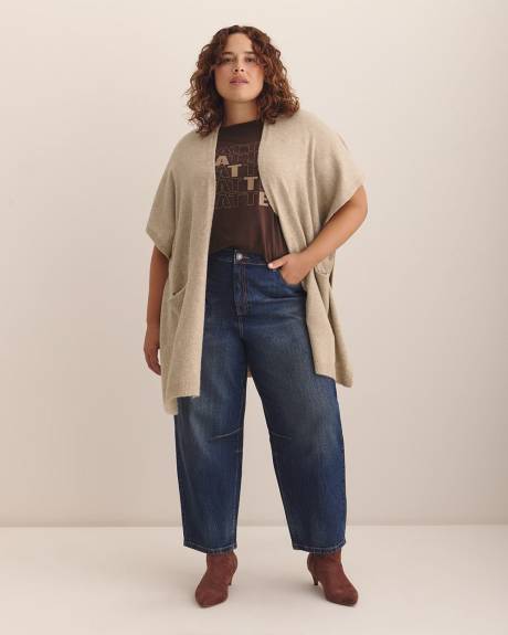 Cape en tricot avec poches