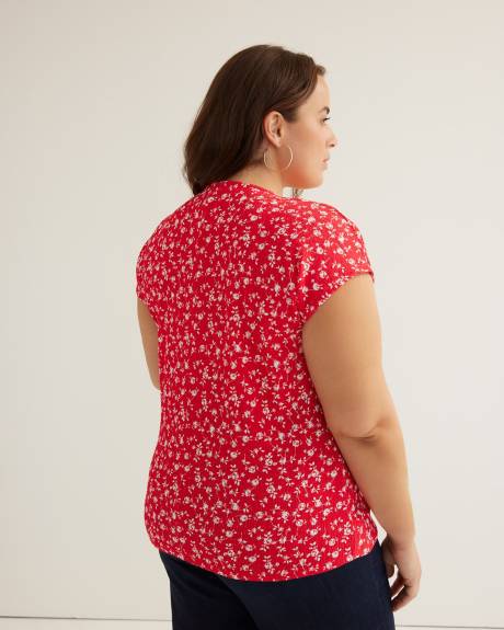 Haut extensible imprimé avec col en V et anneau décoratif