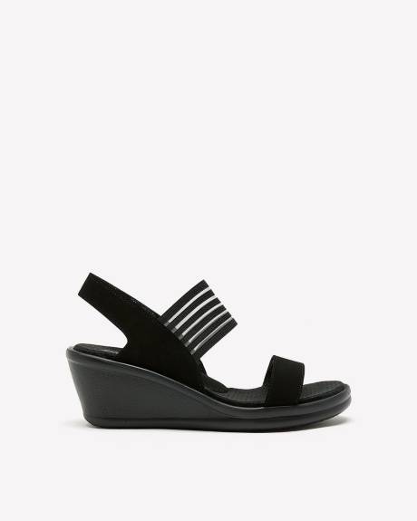 Sandale noire Rumblers à talon compensé avec sangle arrière, pied large - Skechers