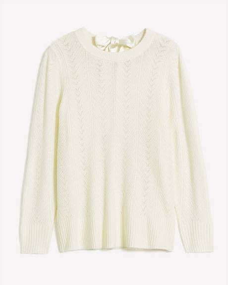 Pull à manches longues avec ouverture au dos et boucle en satin