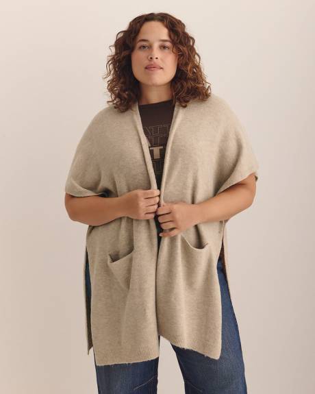 Cape en tricot avec poches