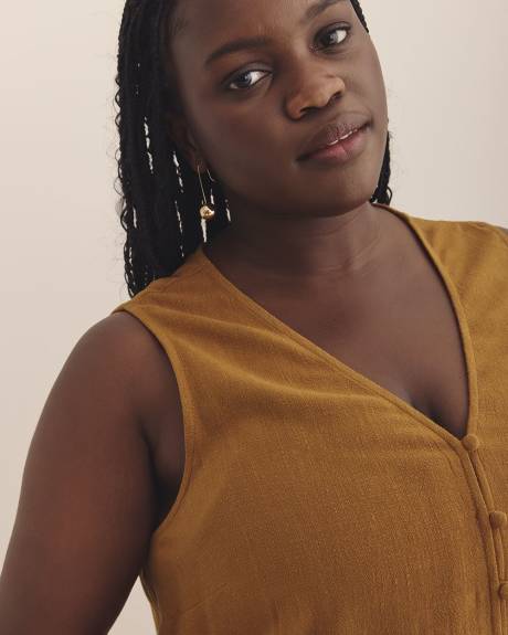 Blouse boutonnée sans manches à encolure en V