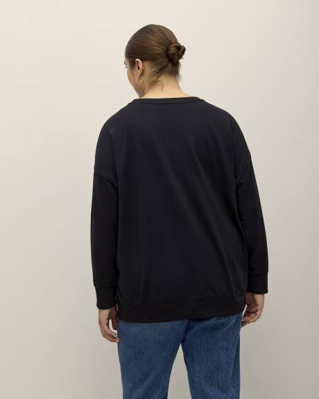 Pull noir à col rond avec imprimé de Snoopy