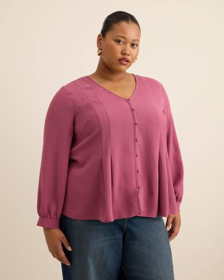 Blouse évasée à manches longues en satin plissé
