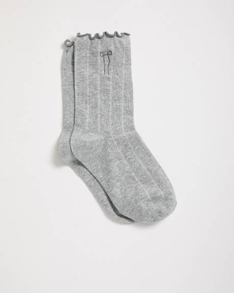 Chaussettes à rebord ondulé avec boucle brodée