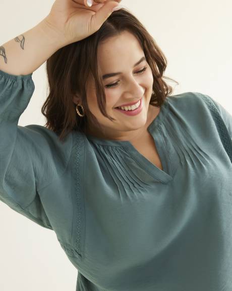 Blouse fluide avec encolure fendue et manches 3/4