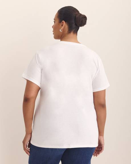 T-shirt blanc à manches courtes et col rond avec imprimé de Schtroumphette