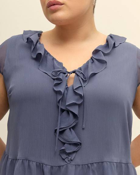 Blouse à manches courtes et col en V à volants