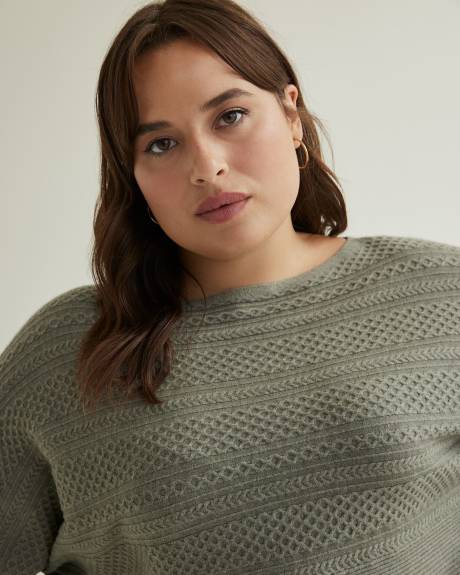 Pull en tricot à mailles torsadées avec manches dolman