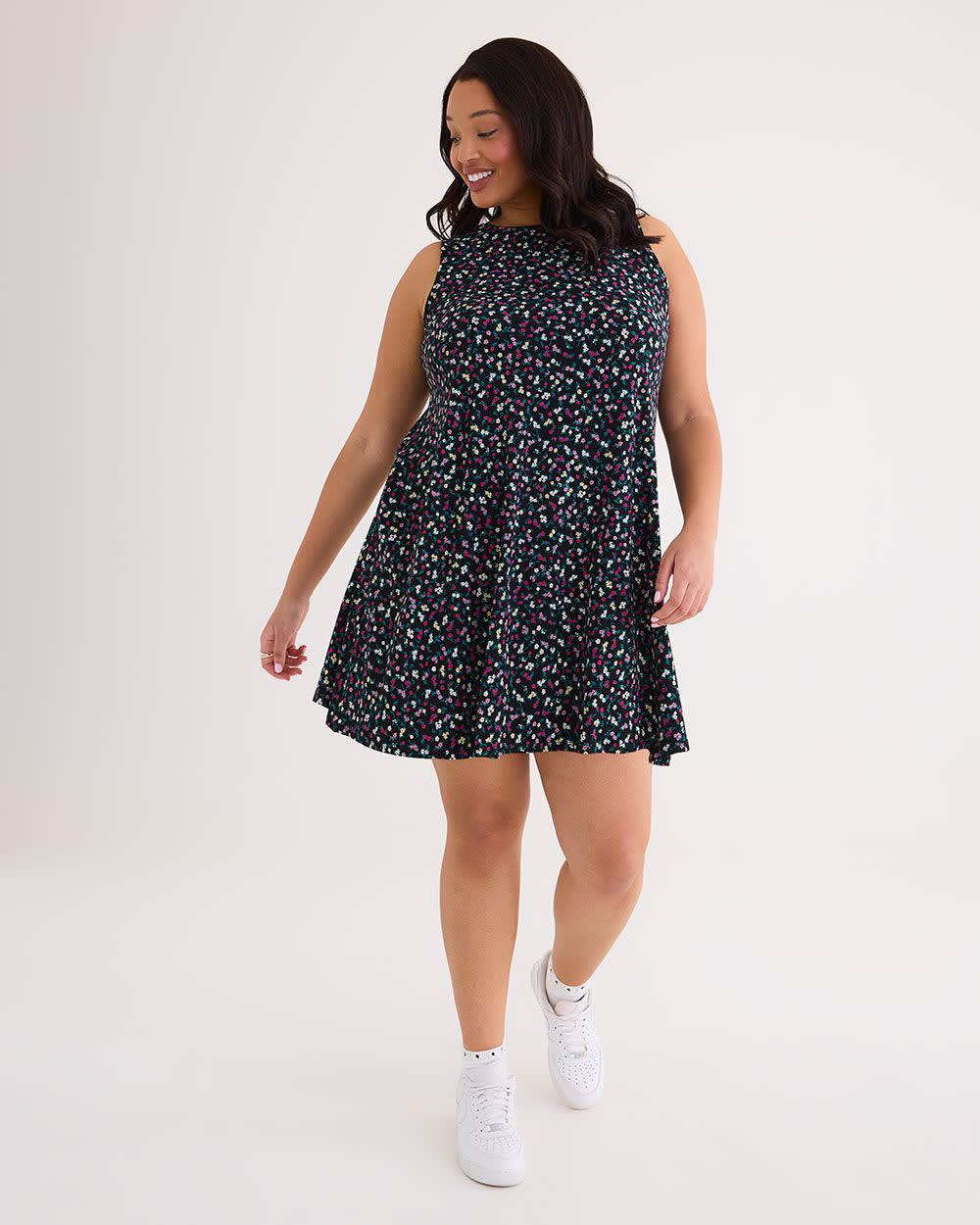 Sleeveless swing dress with hot sale pockets
