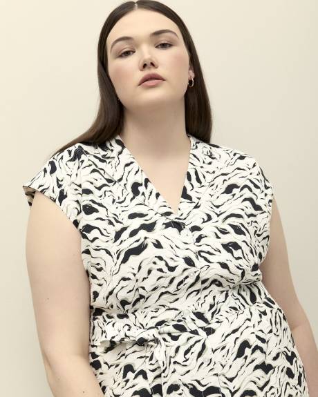 Robe boutonnée mi-longue à motif zébré