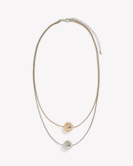 Collier court à deux chaînes avec pendentifs en forme de boule