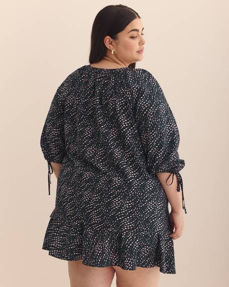 Blouse évasée à pois ondulés avec boutons