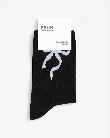 Chaussette noire avec boucle à la cheville