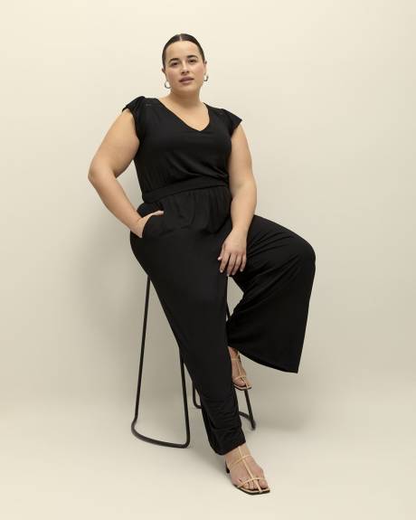 Combinaison à jambe large en tricot noir, tissu responsable