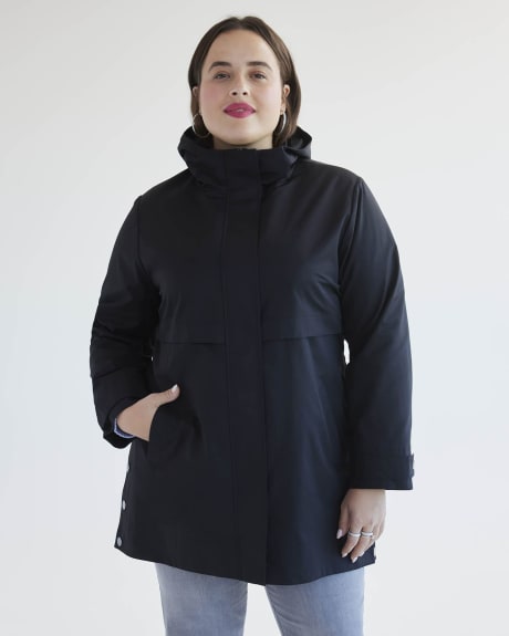Manteau imperméable à capuche avec ourlet asymétrique