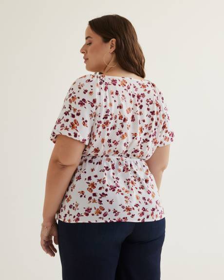 Blouse croisée imprimée avec manches ballon