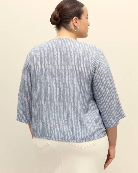 Blouse à encolure en V nouée à l'avant, tissu responsable
