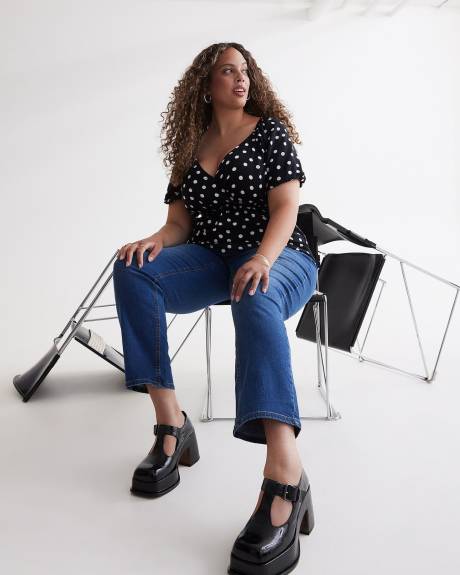 Blouse croisée imprimée avec manches ballon