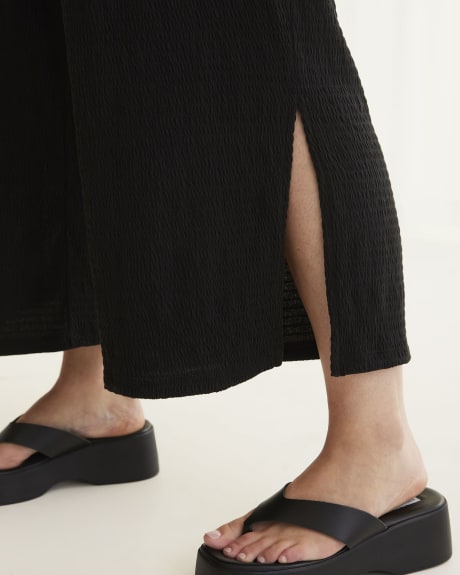 Pantalon court en tricot texturé à jambe évasée