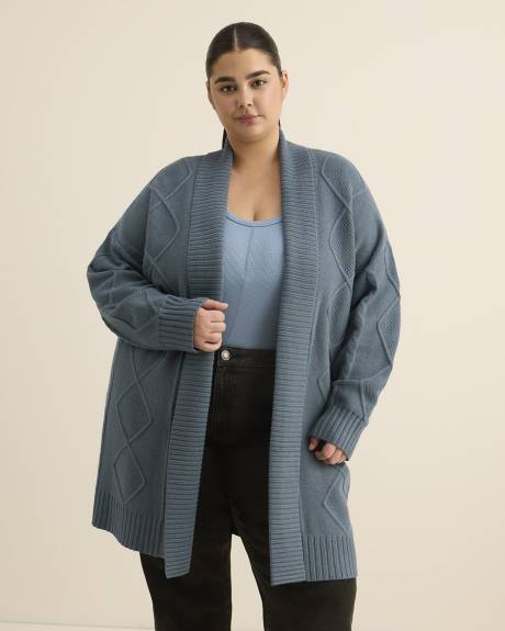 Veste cardigan tunique à mailles torsadées