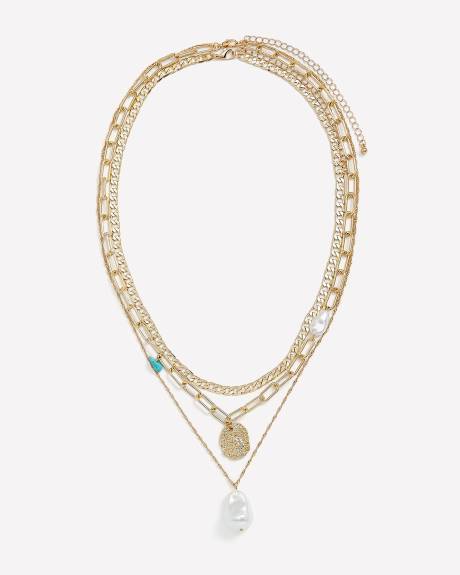 Collier à trois chaînes avec perle et medaillon