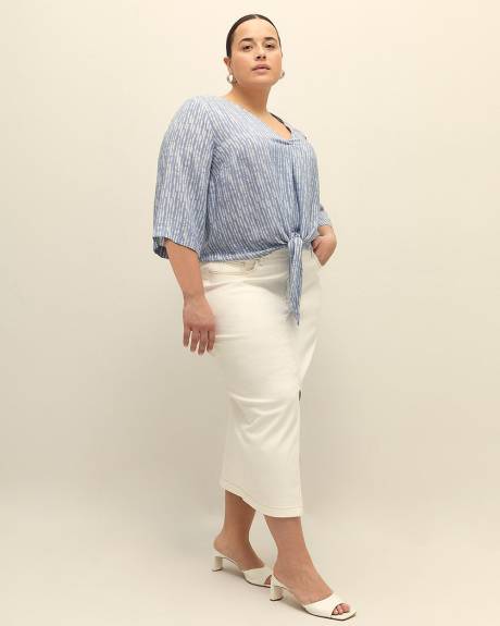 Blouse à encolure en V nouée à l'avant, tissu responsable