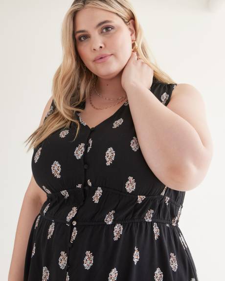 Robe boutonnée sans manches noire avec imprimé