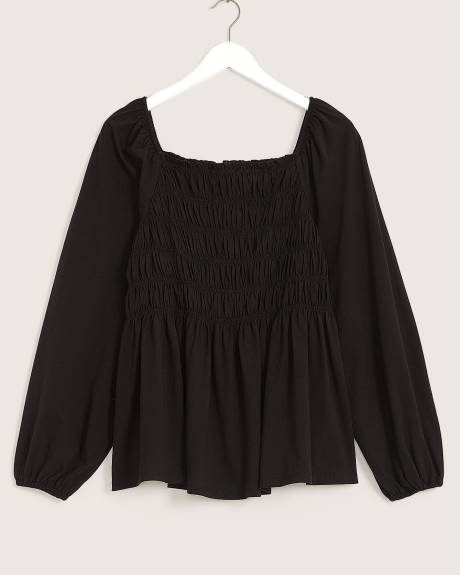 Haut fleuri à smocks avec encolure carrée