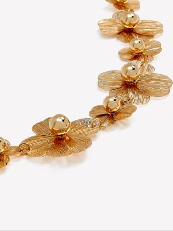 Bracelet orné de fleurs dorées en maille