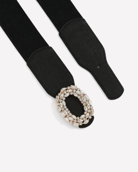 Ceinture élastique noire avec boucle ovale ornée de pierres