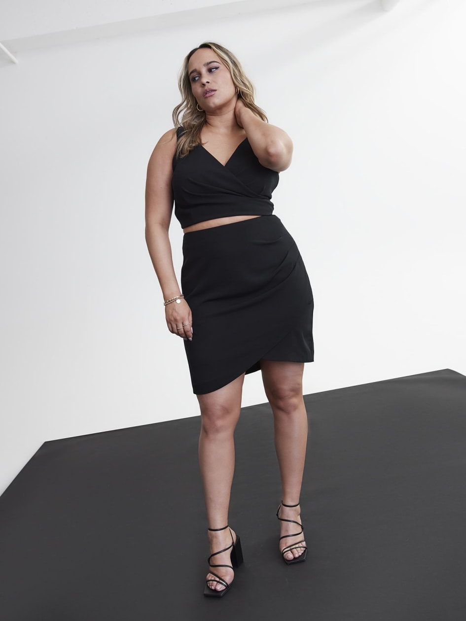 Black Mini Wrap Skirt With Side Pleats - Addition Elle