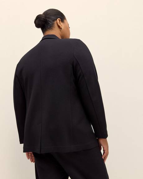 Veston noir en pointe de Rome avec col tailleur, tissu responsable