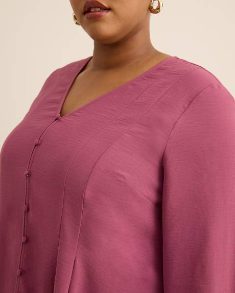 Blouse évasée à manches longues en satin plissé