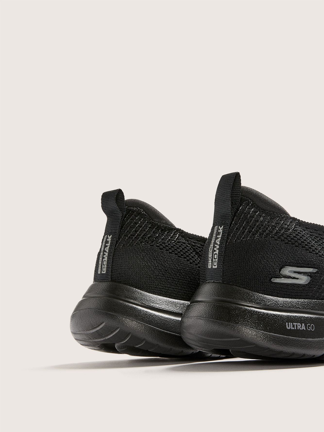 skechers black slip on sneakers