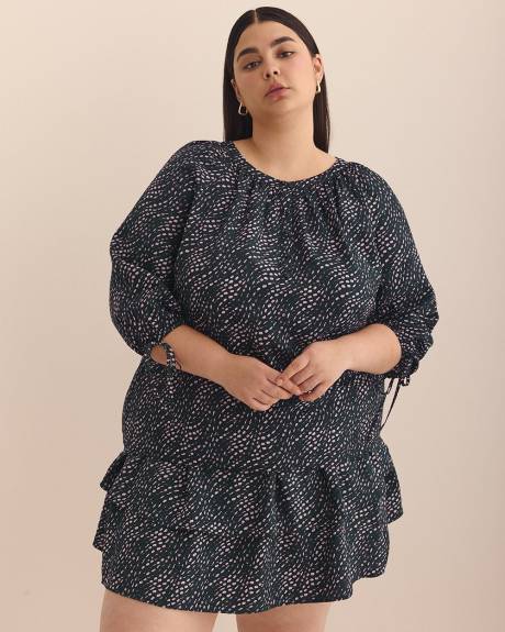 Blouse évasée à pois ondulés avec boutons