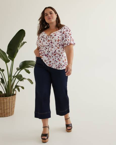 Blouse croisée imprimée avec manches ballon