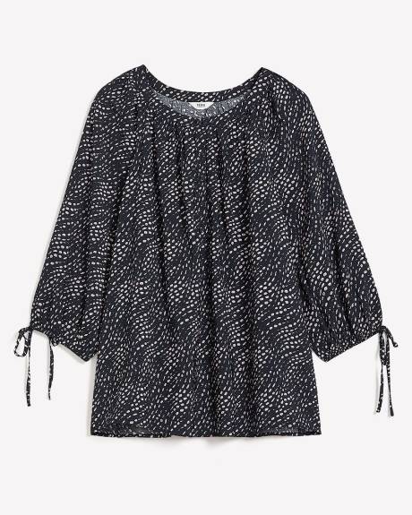Blouse évasée à pois ondulés avec boutons