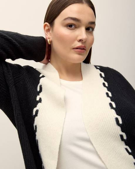 Cardigan tunique en mailles torsadées