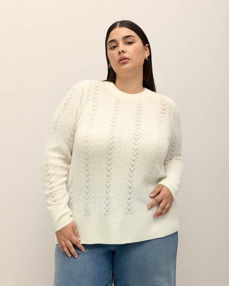 Pull à manches longues avec ouverture au dos et boucle en satin