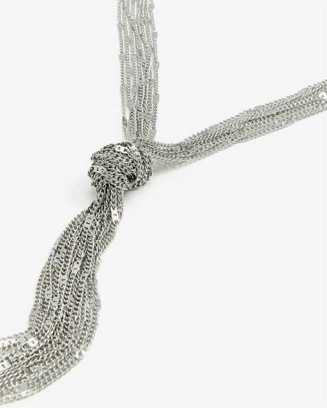 Collier long scintillant avec noeud