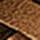 Ceinture tressée cognac en faux suède