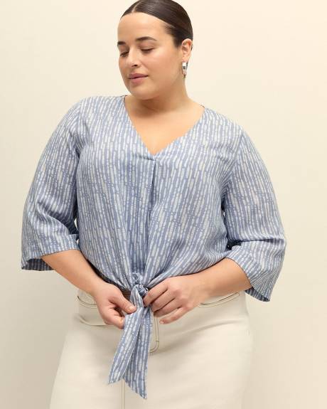 Blouse à encolure en V nouée à l'avant, tissu responsable