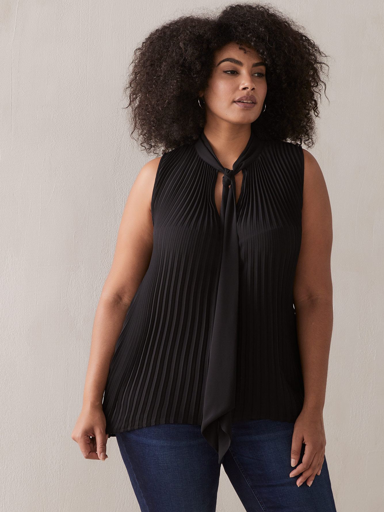 sleeveless bow tie blouse